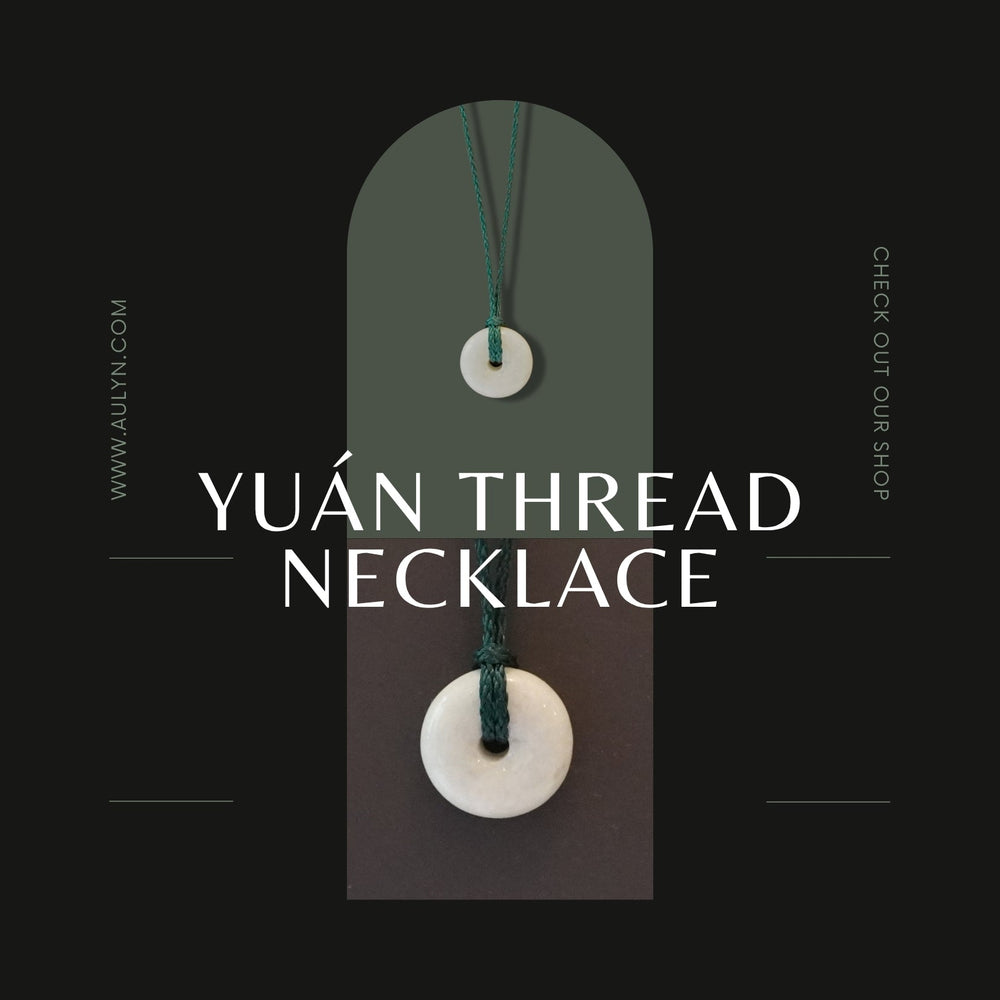 Yuán Thread jade necklace with natural donut-shaped jade pendant on black or dark green thread, designed for sensitive skin with no metal components.