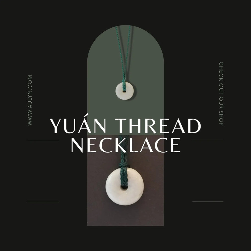 Yuán Thread jade necklace with natural donut-shaped jade pendant on black or dark green thread, designed for sensitive skin with no metal components.