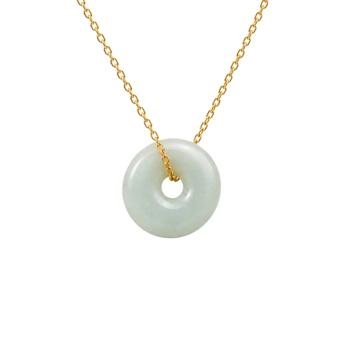 Necklace with a jade pendant on a gold chain against a white background