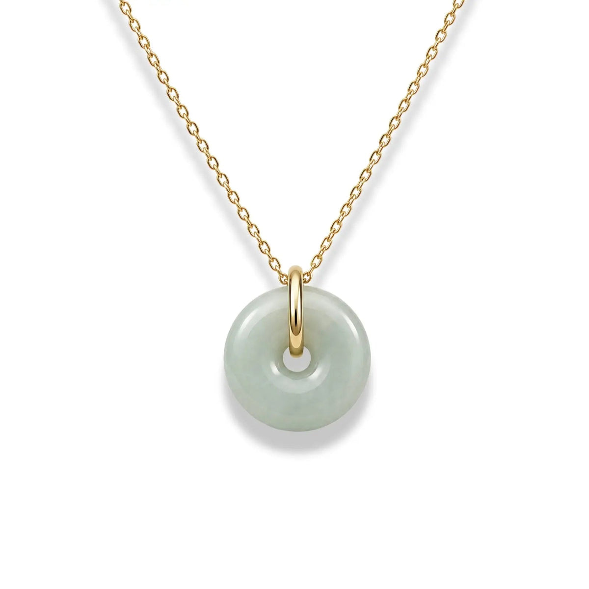 Necklace with a gold chain and green jade pendant on a white background