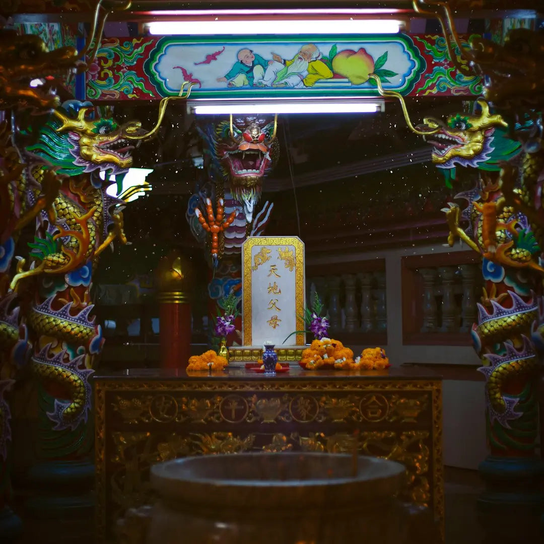 A shrine with a statue in the middle of it - Photo by Alexia Yver on Unsplash
