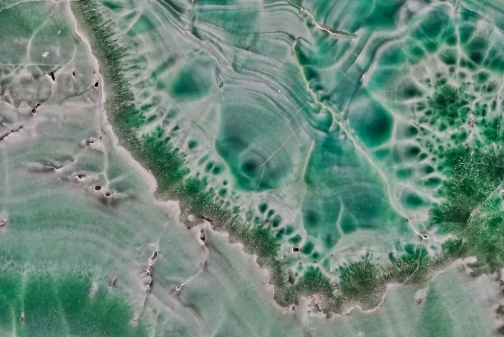 green and white abstract painting - Photo by THLT LCX on Unsplash