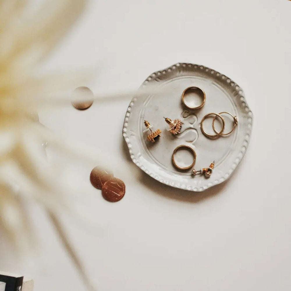 gold-colored jewelries - Photo by Tessa Edmiston on Unsplash