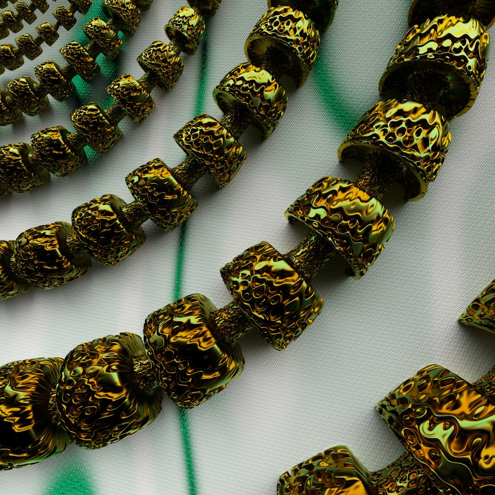 a close up of a number of beads on a table - Photo by Rick Rothenberg on Unsplash