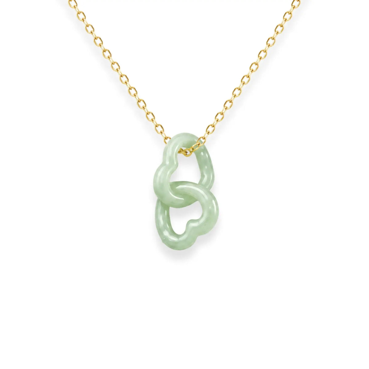 Necklace with a jade pendant on a gold chain against a white background