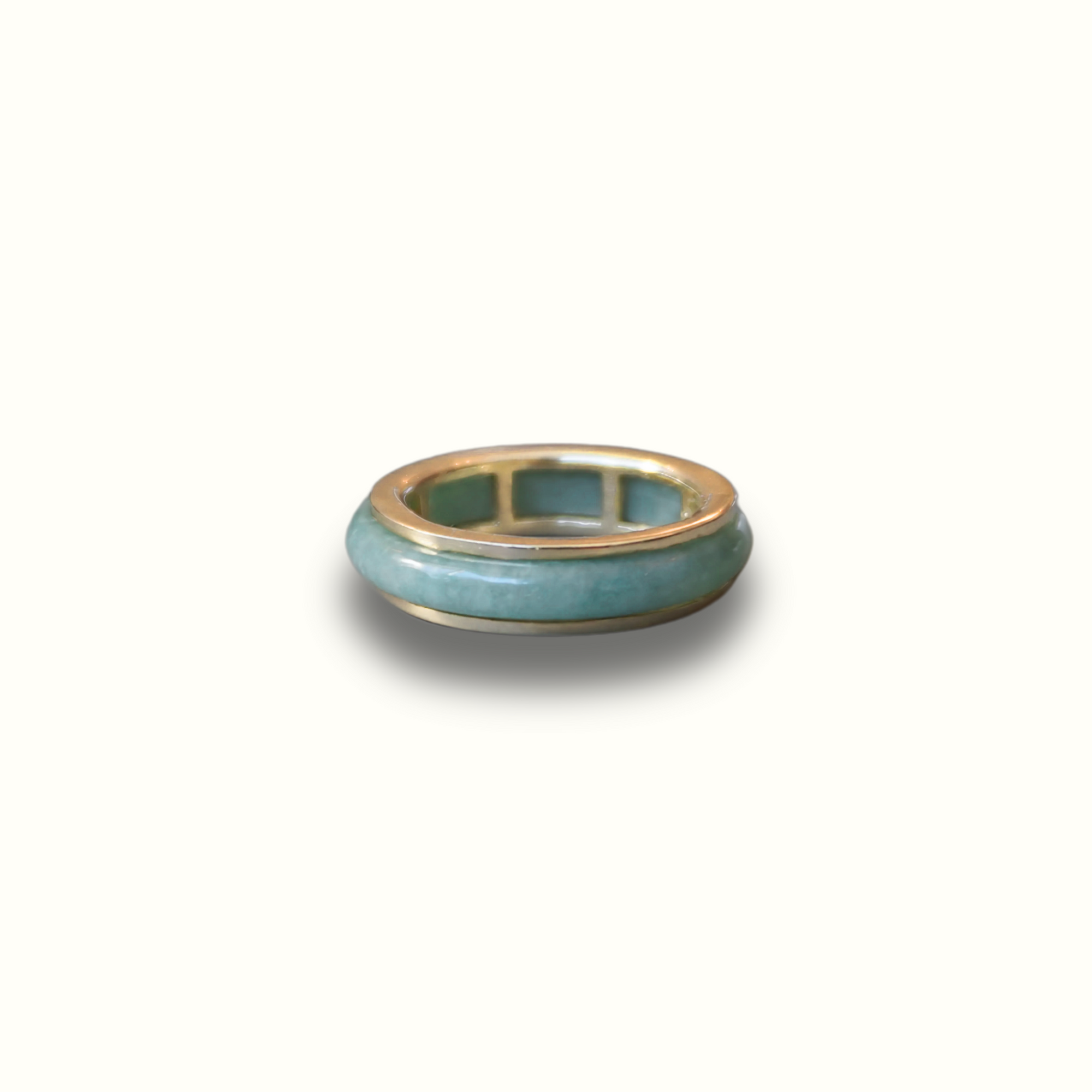 Minimalist solid gold ring featuring green jadeite stone, available in 10K, 14K, and 18K gold.