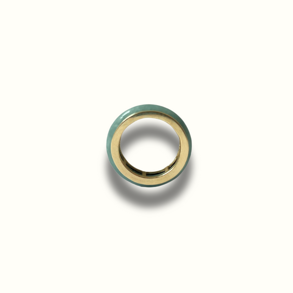 Elegant jadeite ring with solid gold band, representing a modern heirloom design.