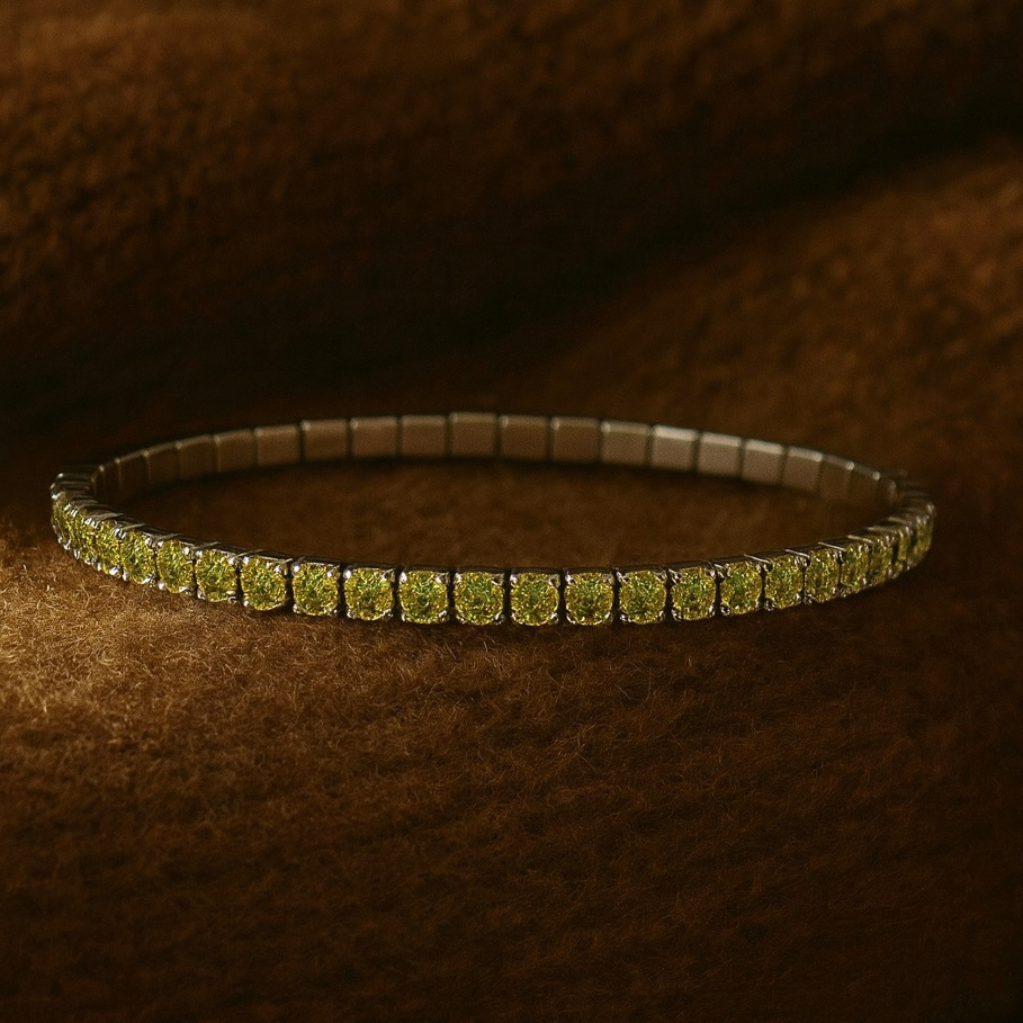 Green gemstone bracelet on a brown textured background