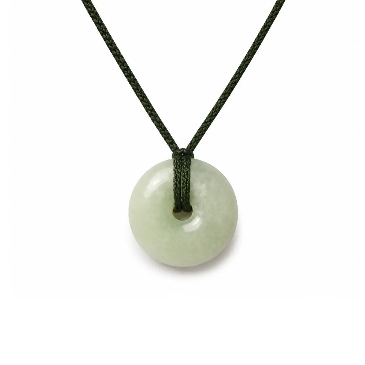 Necklace with a round, light green pendant jade on a white background
