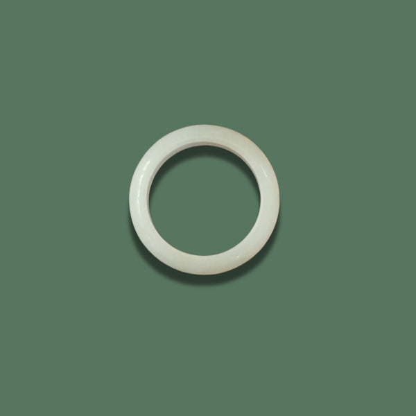 Top angle of White jadeite ring (Nivelle Ring) displayed on a soft green background, highlighting its smooth, polished surface and minimalist design.