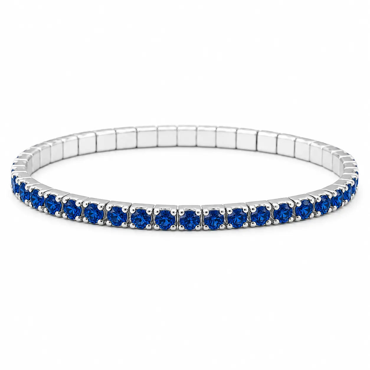Silver bracelet with blue gemstones on a white background