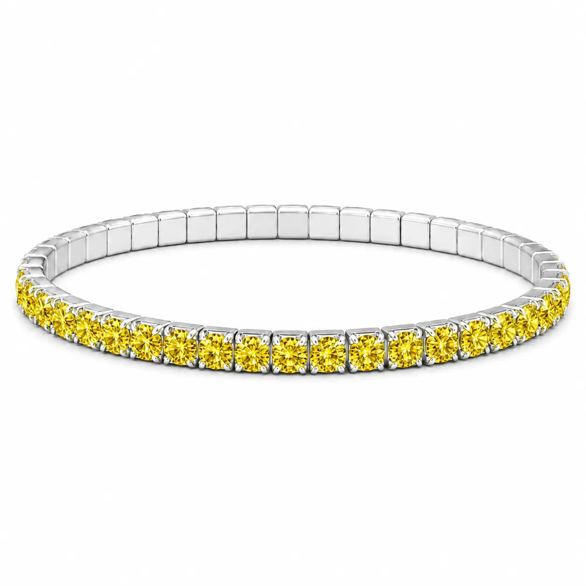 Silver bracelet with yellow gemstones on a brown textured background