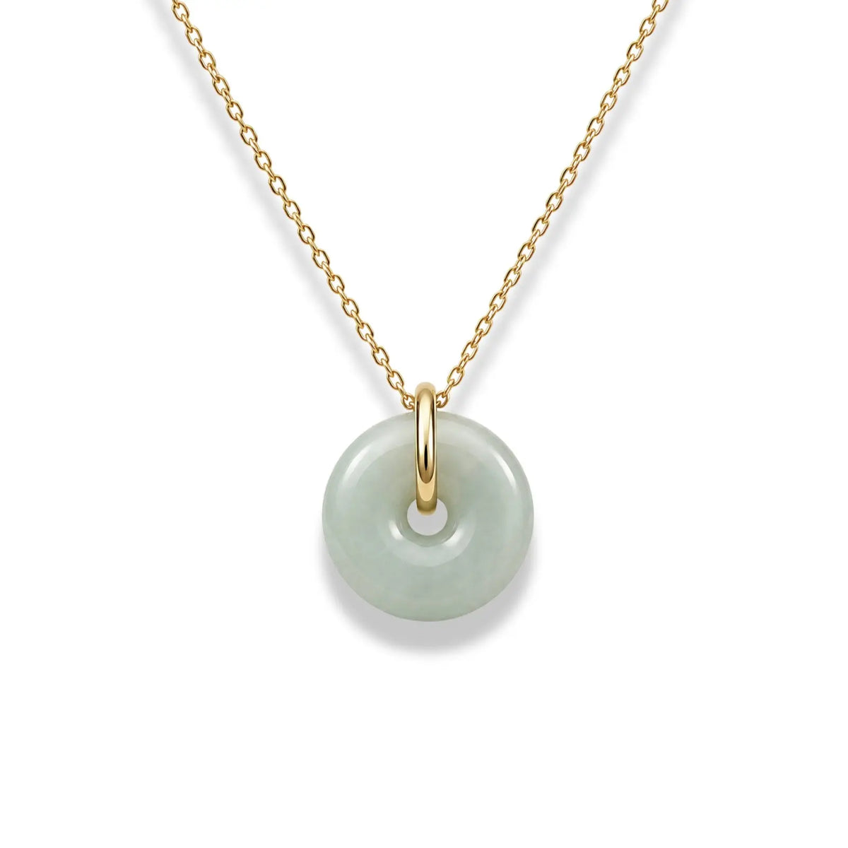 Necklace with a gold chain and green jade pendant on a white background