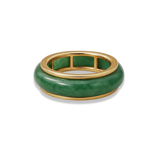 Green jade ring with gold band on a white background